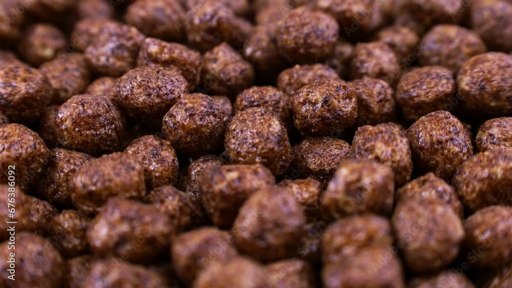 Brown chocolate breakfast balls cereal texture circle rotation close up