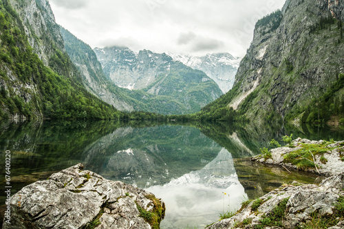 Mountain lake, reflection of the mountains around. 