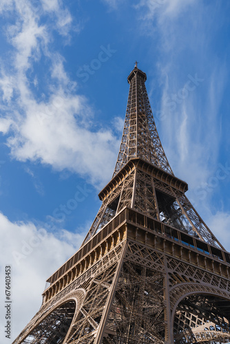 Eiffel Tower, blue sky with white clouds