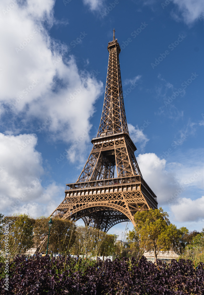 Eiffel Tower, blue sky with white clouds