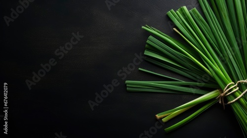 Lemongrass on black background. Healthy food. Free space for your text