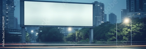 An empty billboard on a city highway. Blank billboard with copy space