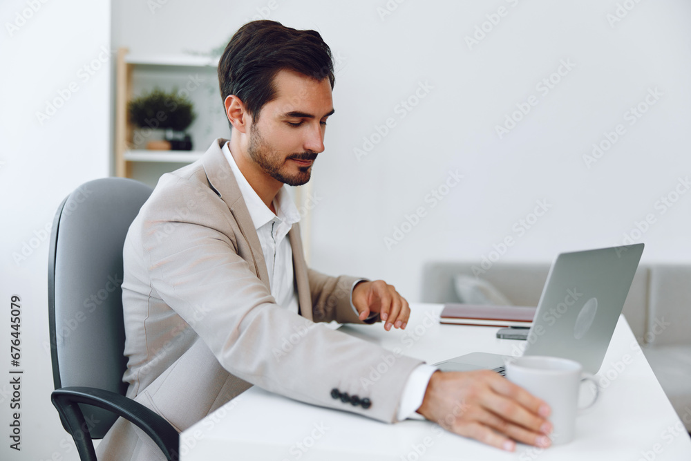 Suit man businessman handsome gesturing victory happy job office winner laptop business technology portrait Suit man businessman handsome gesturing victory happy job office winner laptop business technology portrait