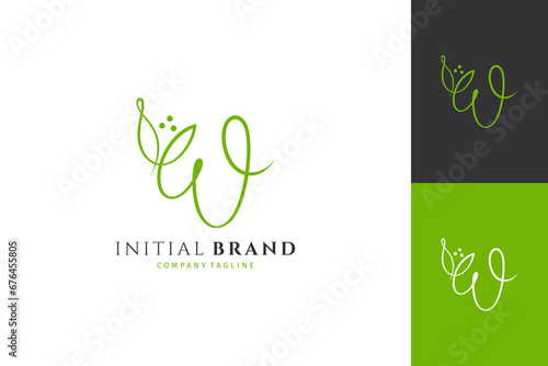 Handwritten initial letter W, simple signature vector logo with flower bud shape variation