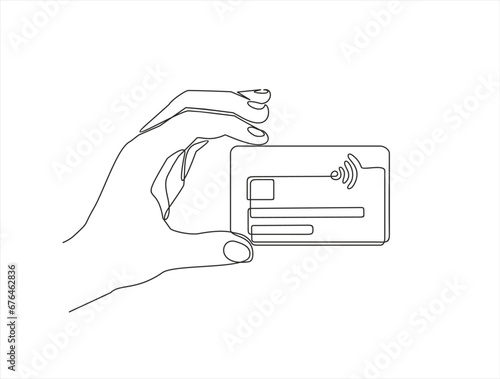 Continuous one line drawing of hand holding credit card. Contactless bank card in hand.