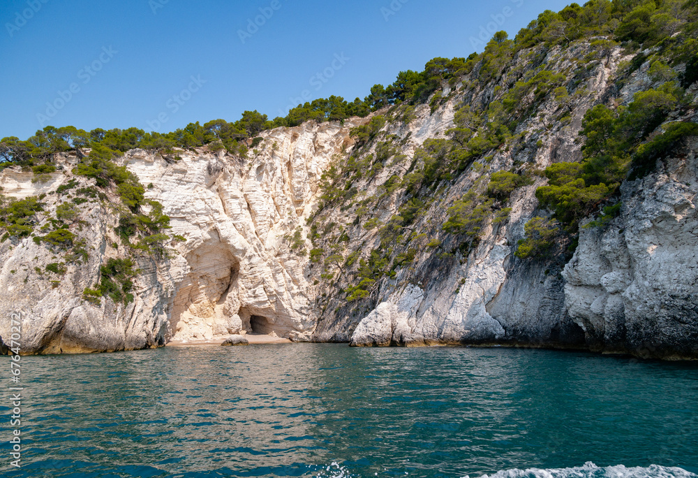 view from the boat of the famous rock caves of the Gargano coast