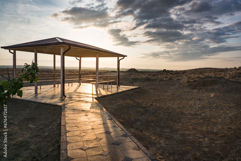 Gazebo for relaxing in the desert early in the morning at sunrise