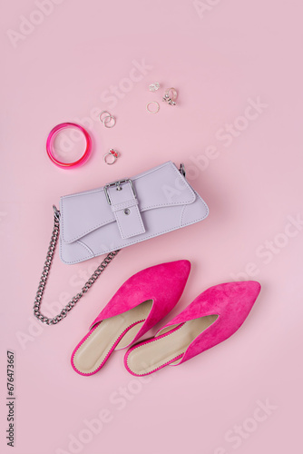 Handbag with pink shoes and jewelry. Women's stylish and elegant accessories. Fashion spring or autumn outfit. Flat lay, top view, overhead.