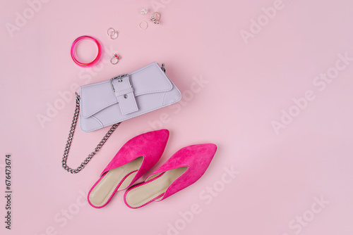 Handbag with pink shoes and jewelry. Women's stylish and elegant accessories. Fashion spring or autumn outfit. Flat lay, top view, overhead.