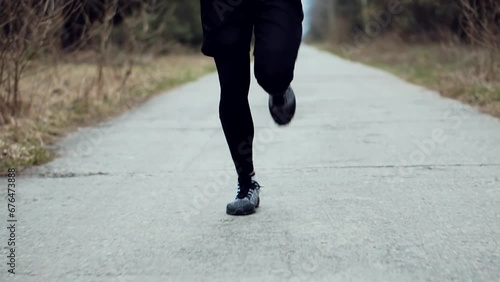Triathlete preparing for jogging, sprinting and stamina exercises	