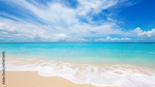 Beautiful beach with white sand  turquoise ocean  blue sky with clouds and palm tree over the water