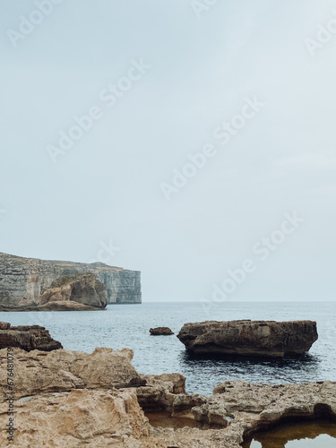 Rock cliffs and sea