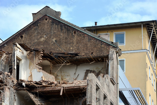 A house with crumbling walls destroyed by a rocket attack © Serhii