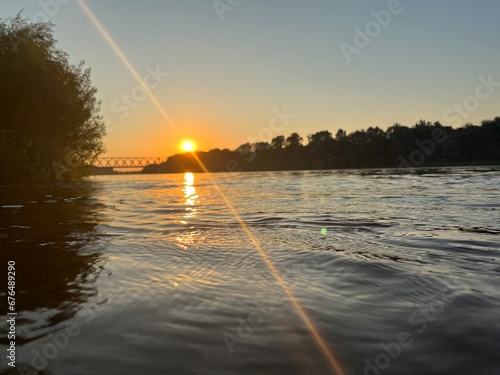 a beautiful summer sunset over the Berezina river photo