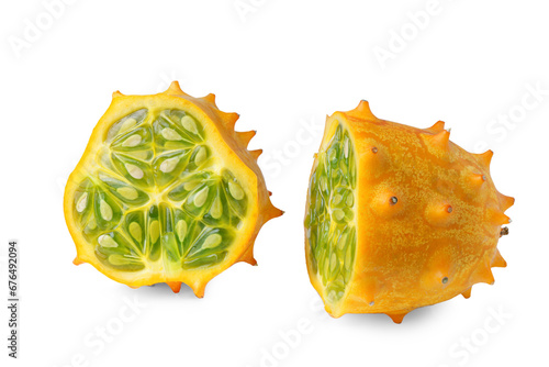 Kiwano fruit, green horned melon isolated on white, transparent background, PNG. Organic orange kiwano, African horned melon slices with green, jelly like inside with seeds close up.