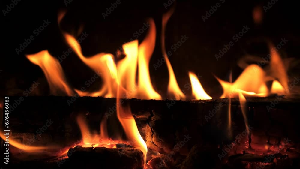 A beautiful fire is burning in the home fireplace. 4 K 50 fps. A beautiful fire is burning in the home fireplace. 4 K 50 fps.