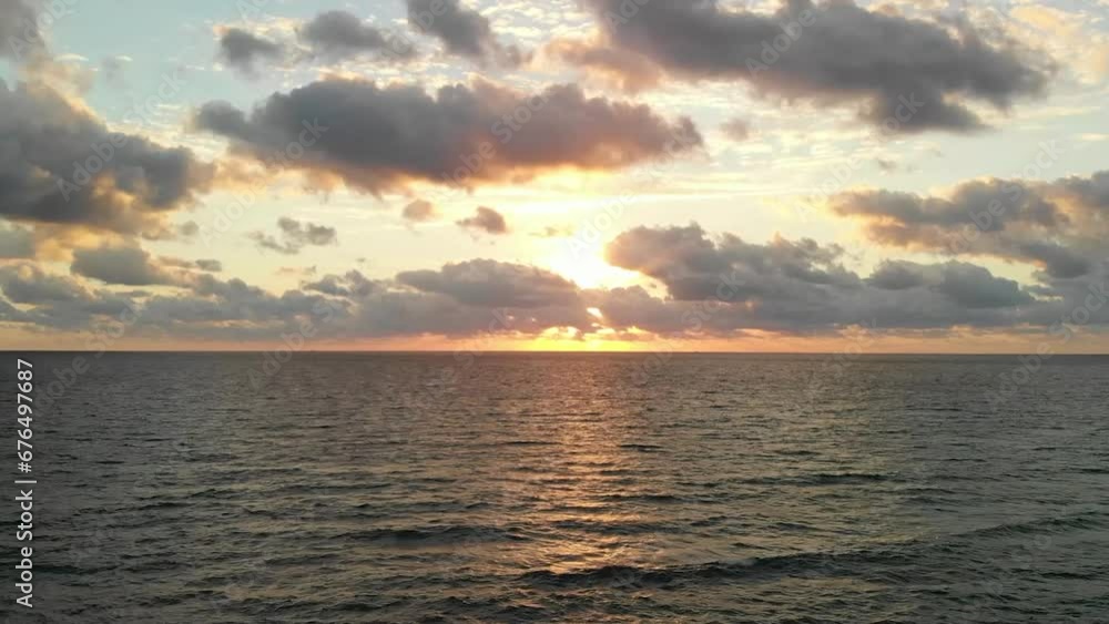 Breathtaking sunset clouds over the ocean in South Florida Breathtaking sunset clouds over the ocean in South Florida