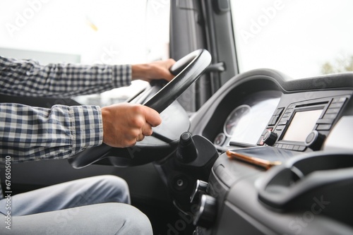 Truck drivers big truck of driver's hands on big truck steering wheel