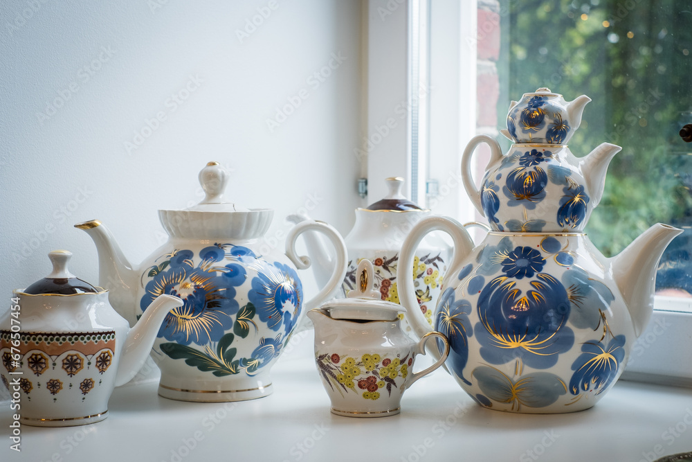 Different ceramic teapots from Soviet Union culture. Russian porcelain dishes. Different ceramic teapots from Soviet Union culture. Russian porcelain dishes.