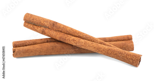 Two cinnamon sticks isolated on white background with shadow
