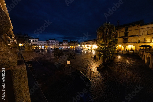 Evening lights adorn Trujillo's main square.