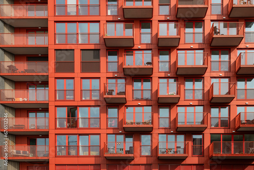 Photography Modern red colored apartments in the new NDSM district in Amsterdam