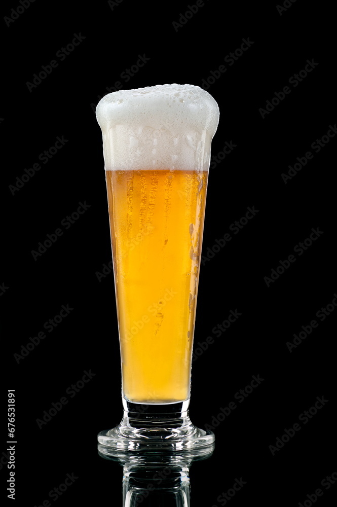 cold glass of refreshing beer on black background cold glass of refreshing beer on black background