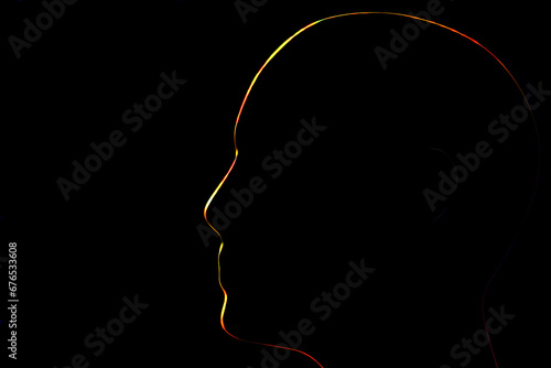 red and yellow shing contours of a human head