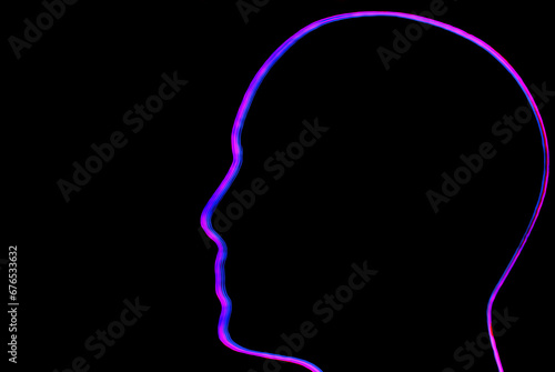 neon blue and pink shinig contours of the profile from a human head