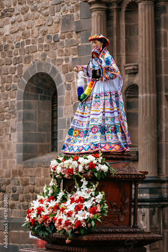 The statue of the Virgen Reyna de Belén is carried out of Cusco Cathedral .Peru
 photo