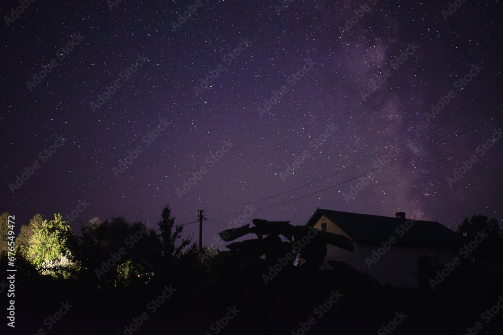 Beautiful landscape of Milky Way in the village during Starfall Beautiful landscape of Milky Way in the village during Starfall