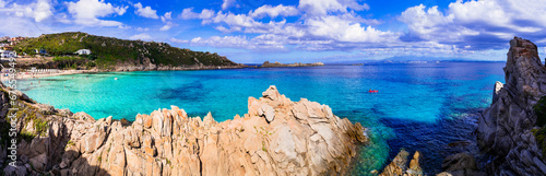 Italy summer holidays. Sardegnia island nature scenery. one of the most beautiful beaches - Santa Teresa di Galura in northern part with turquoise sea and incredible rock formations photo