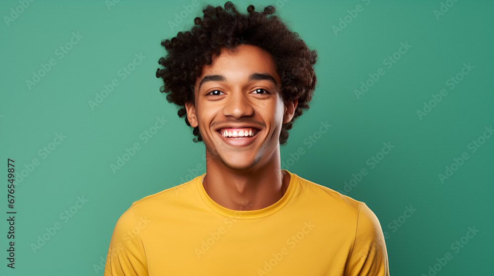 a young diverse presenter smiling in front of a bright solid colored background a young diverse presenter smiling in front of a bright solid colored background