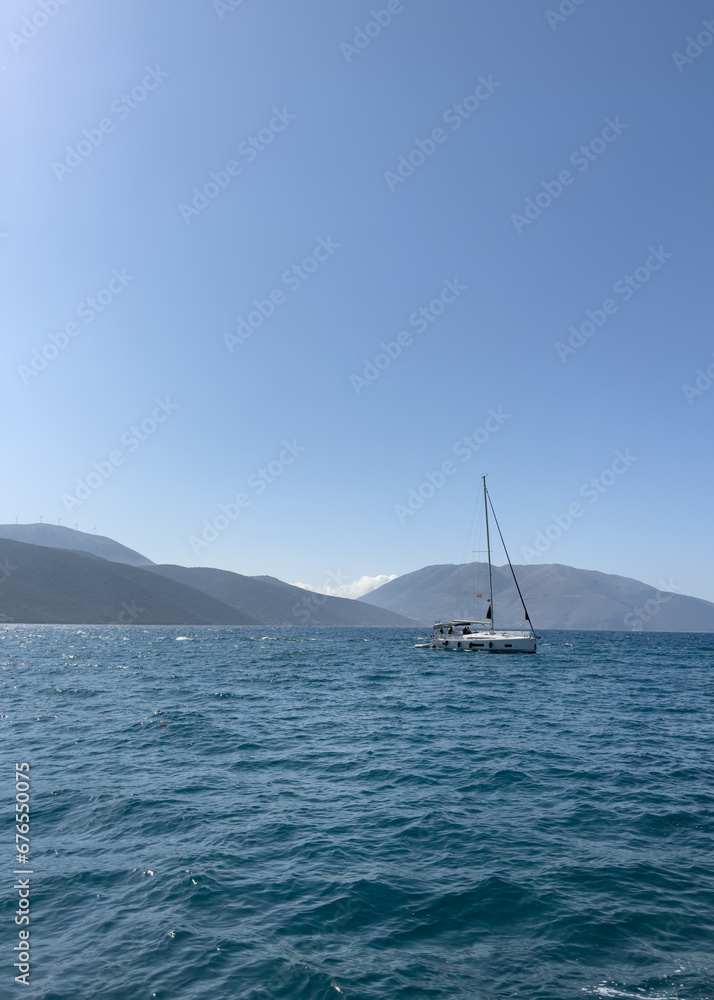 Yachts are sailing ahead on the course. Ithaca Greece Yachts are sailing ahead on the course. Ithaca Greece