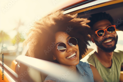 Happy young couple driving a car to the countryside.. Summer vacation and travel concept