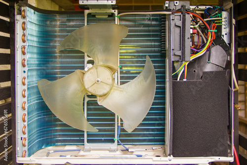 Disassembled air conditioner, air conditioner repair