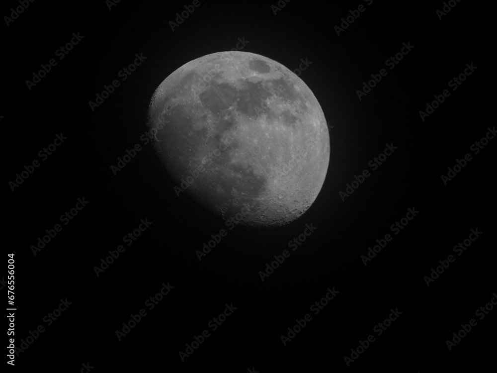 Closeup of the half moon shining in a dark night sky Closeup of the half moon shining in a dark night sky