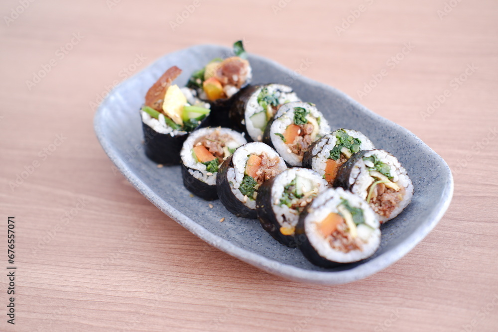 Sushi roll japanese food style on wooden table background.
