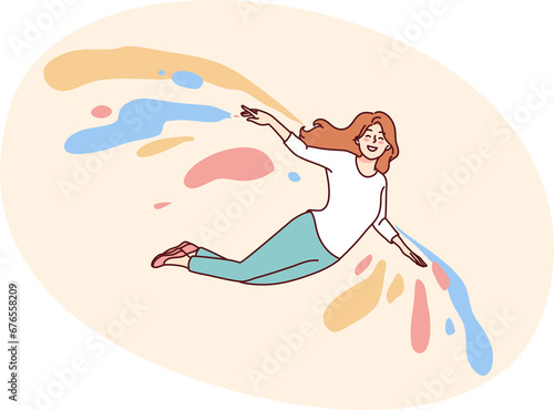 Smiling girl flying on colorful wings