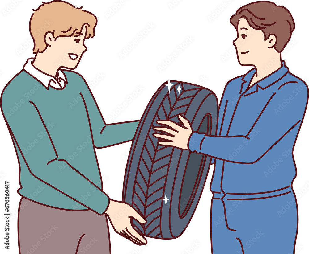 Fototapeta premium Man buys new tires for car wheel and consults mechanic, who help make right choice