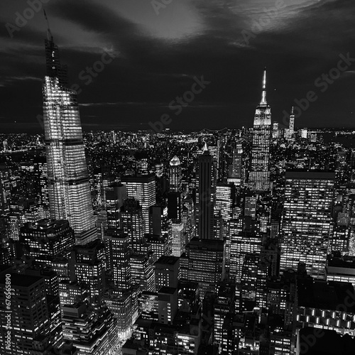 Grayscale shot of New York skyline at night photo