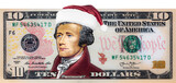 Alexander Hamilton from US 10 dollar banknote in Santa Claus hat
