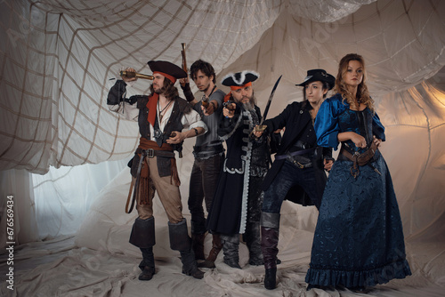 Pirate crew, pirate sailors, a group of different characters, pirate carnival costumes