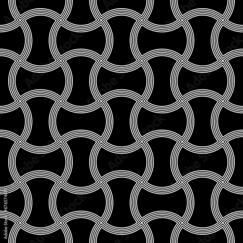 Apple core quilts texture. Seamless surface pattern design with ethnic ornament. Black interlocking axehead figures tessellation on white background. Image with hammerhead shapes. Patchwork motif.