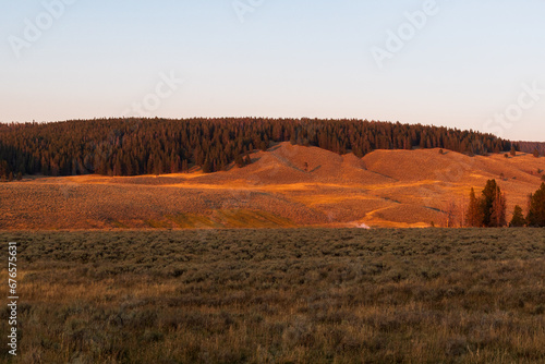 Yellowstone River flows through Hayden Valley at Sunset, Yellowstone National Park