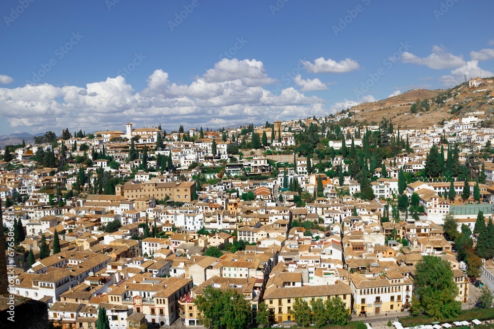 Aerial view of the city of Granada and its beautiful architecture on a sunny day Aerial view of the city of Granada and its beautiful architecture on a sunny day