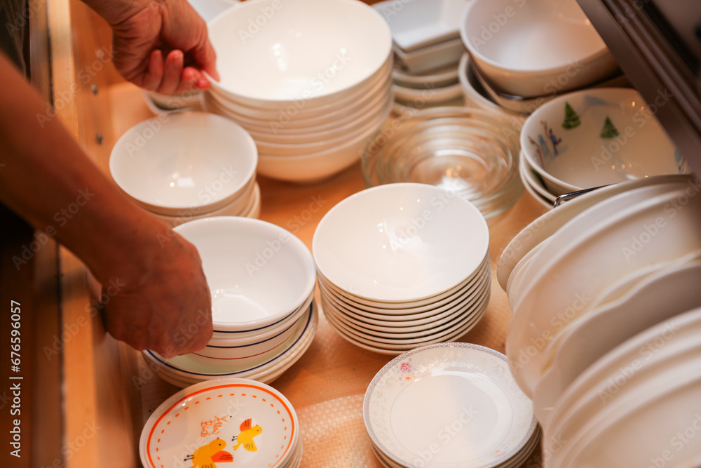 handwashing dishes, symbolizing equality and shared responsibilities