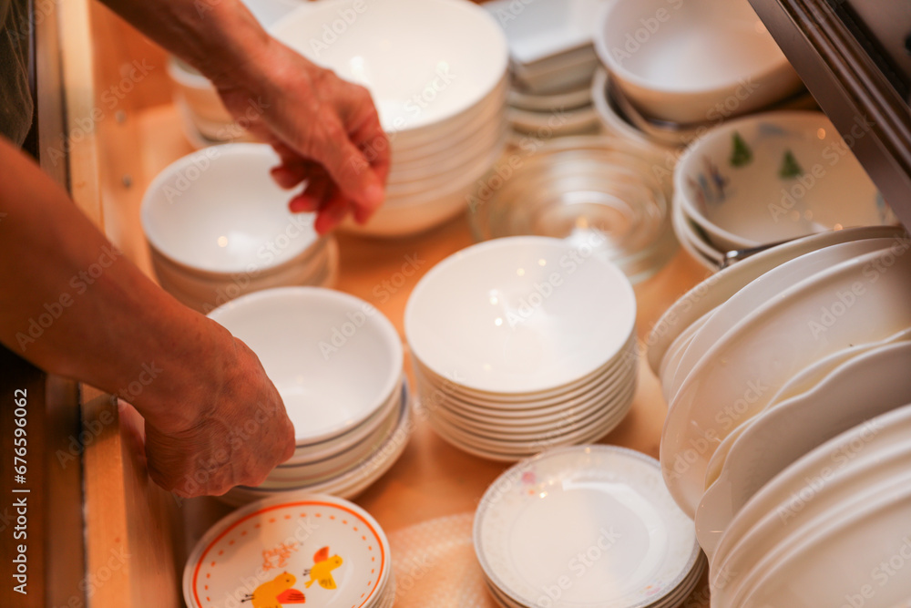 handwashing dishes, symbolizing equality and shared responsibilities