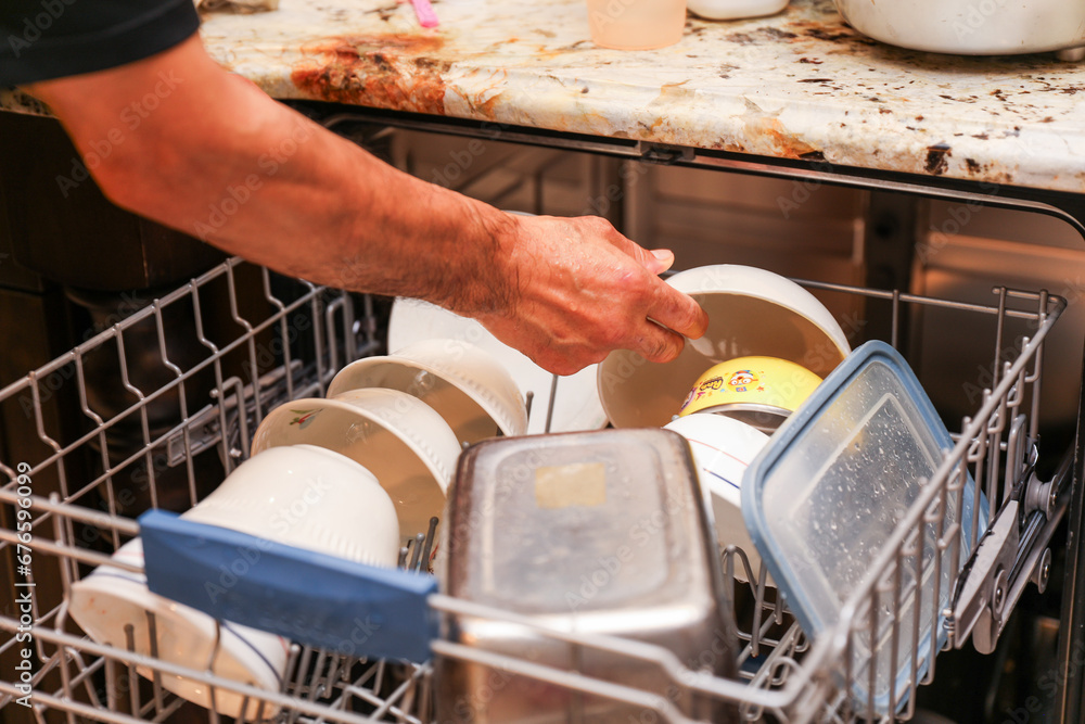 handwashing dishes, symbolizing equality and shared responsibilities