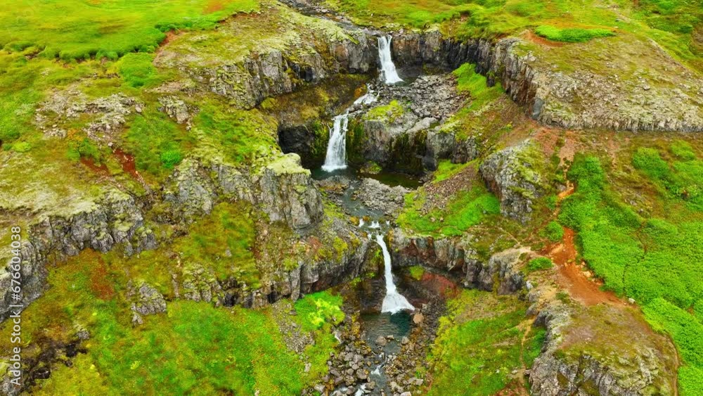 Waterfalls in Mountains, Beautiful Aerial View From Iceland In The Summer Season Waterfalls in Mountains, Beautiful Aerial View From Iceland In The Summer Season